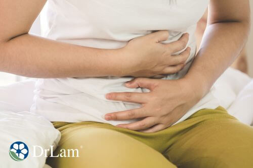 An image of a person having mild stomachache