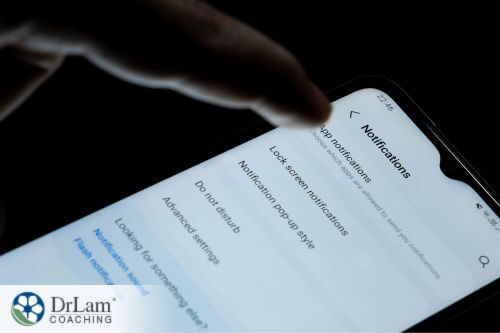 An image of someone turning off phone notifications