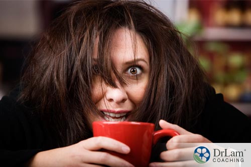 An image of a woman experiencing the negative effects of caffeine