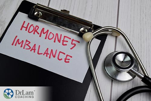 An image of a clipboard with hormones imbalance written on it